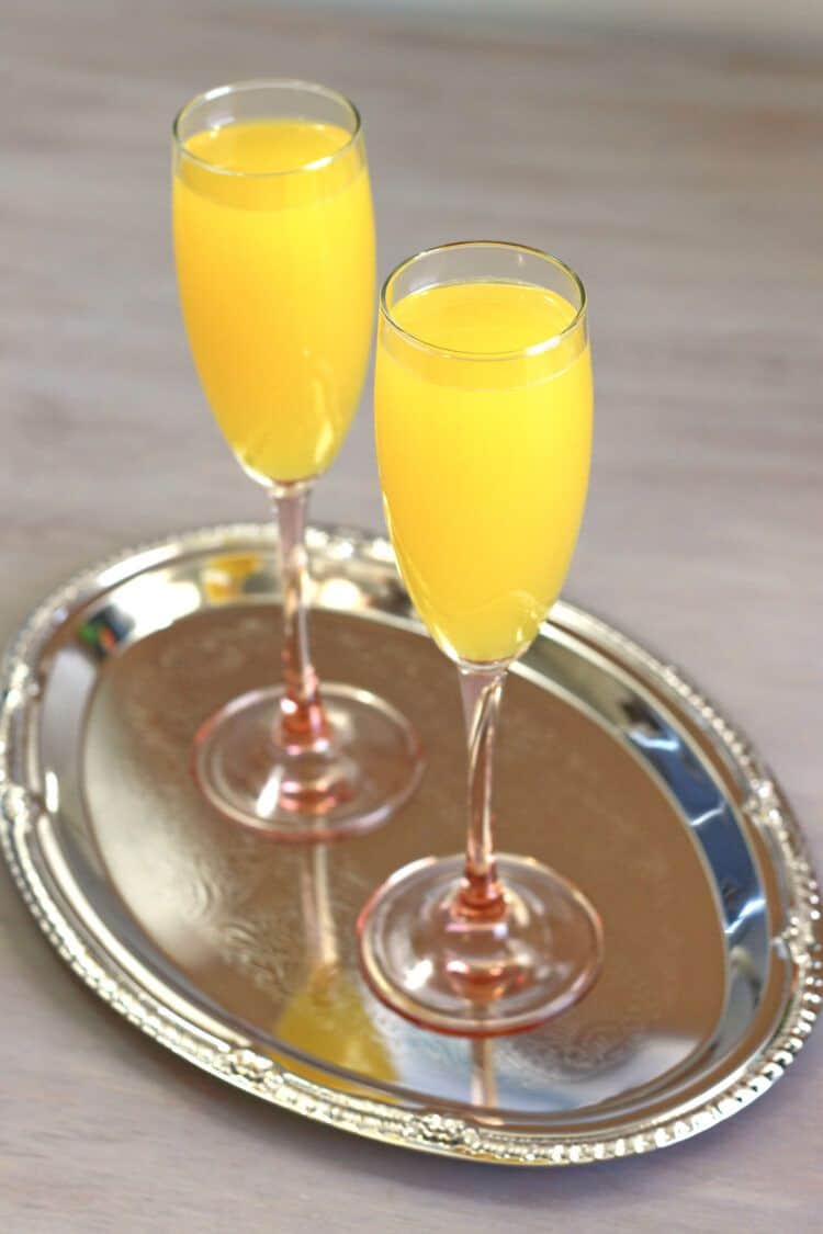 Two Mockmosa drinks on silver tray