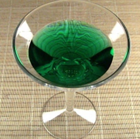Neon Iguana drink in cocktail glass
