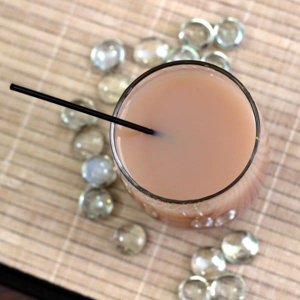 Overhead view of Nutcracker ccocktail surrounded by glass pebbles