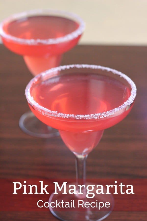 The Pink Margarita recipe adds a touch of grenadine to the traditional tequila, Cointreau and lime. It's a delicious, refreshing, sweet twist on the traditional margarita. #drink #recipes