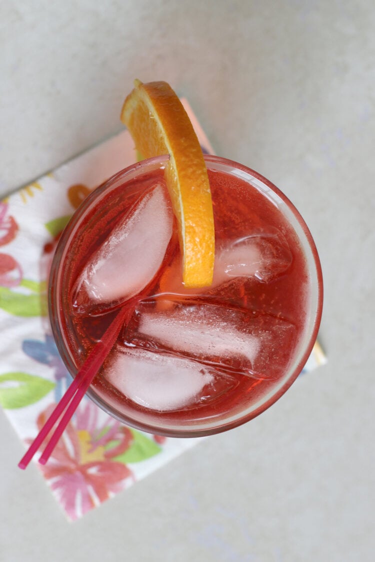 Aviation cocktail with speared cherries garnish