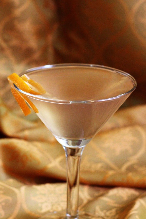 Prohibition cocktail with orange twist