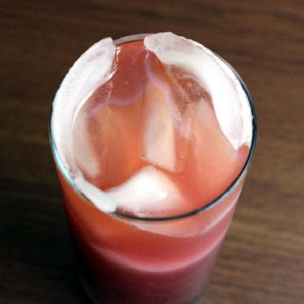 Overhead view of Purple Pushover drink with ice partially melted