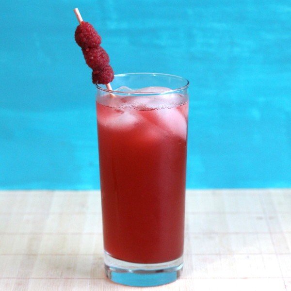Red Frog drink with speared raspberries
