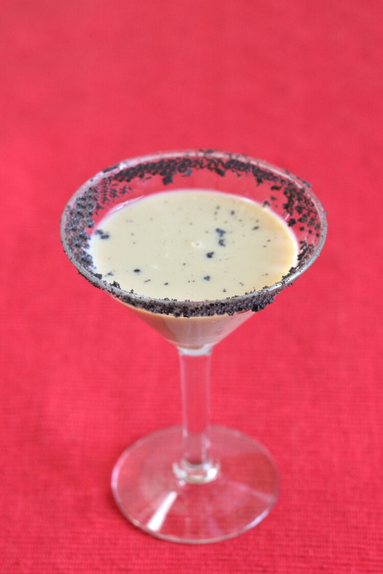 Reindeer Tracks Martini in front of red background