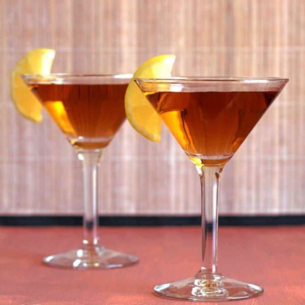 Closeup of two Resolute cocktails with lemon