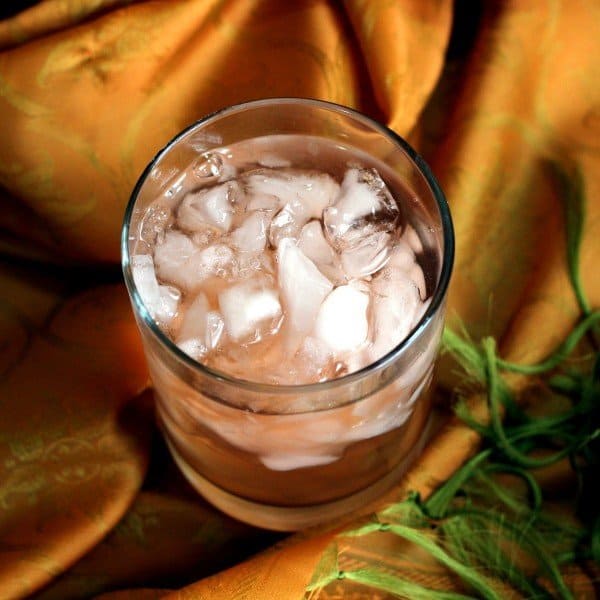 Rum Swizzle drink with crushed ice