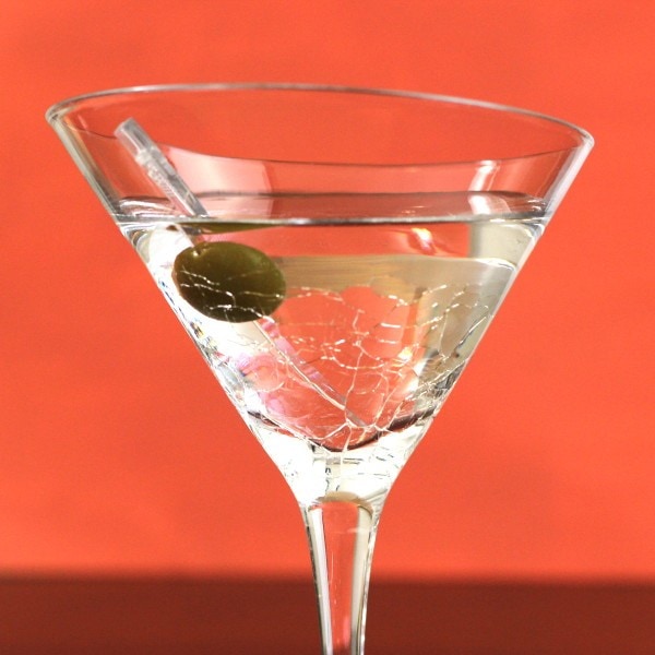 Closeup view of Saketini drink with olive