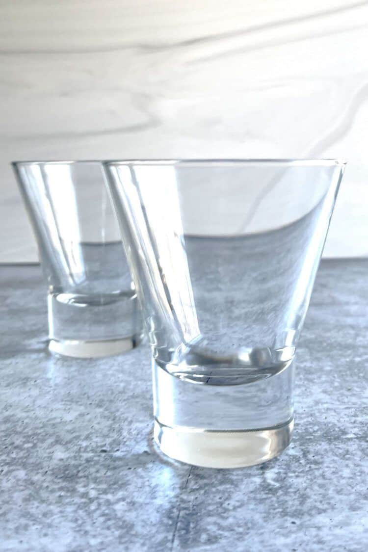 Two stemless martini glasses