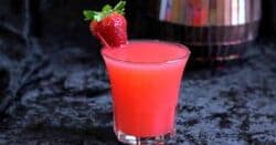 Strawberry Blonde drink with strawberry garnish