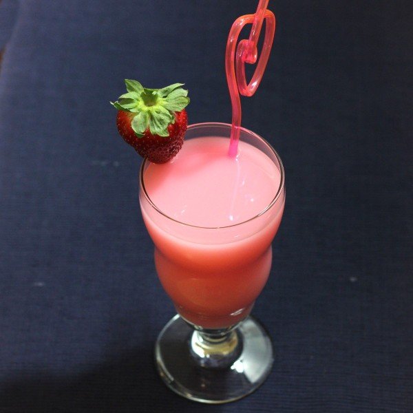 Strawberry Quick cocktail with strawberry on rim