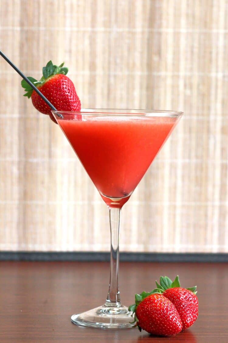 Strawberry Sombrero cocktail with strawberry on rim