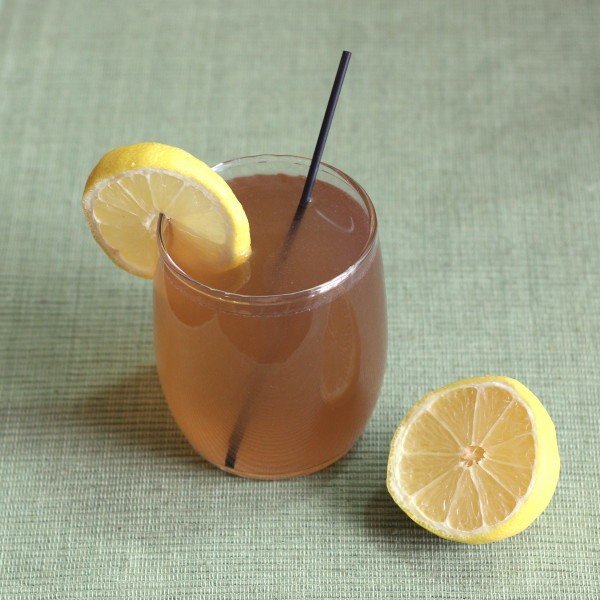 Tequila Sunset drink with lemon