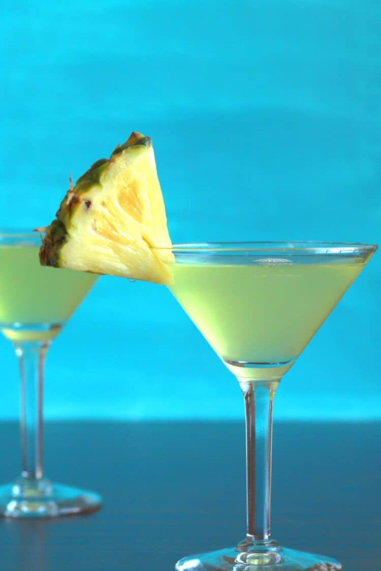 Tropical drinks with pineapple wedges