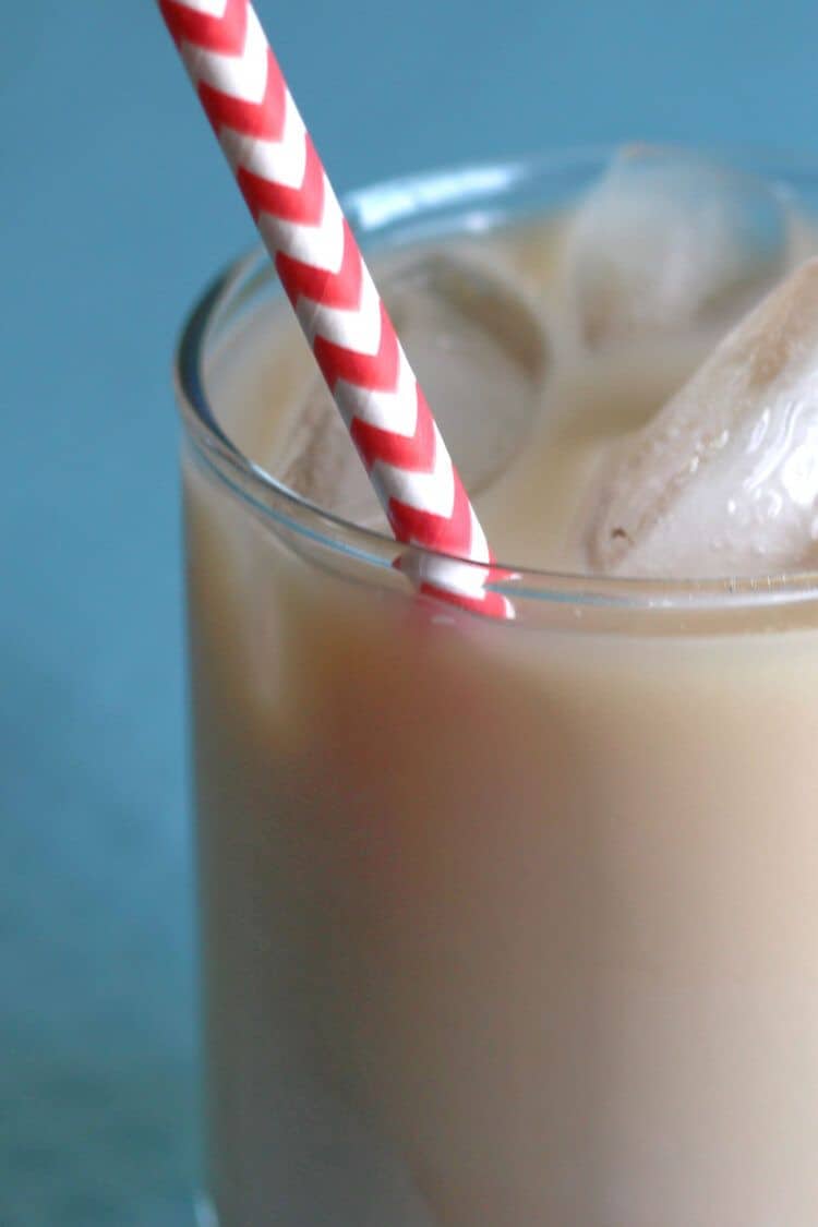 Closeup of red and white paper straw in Velvet Hammer drink