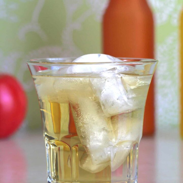 Vodka and Apple Juice cocktail in rocks glass with ice