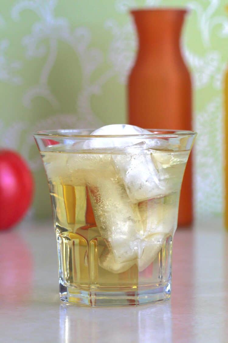 Vodka and Apple Juice cocktail in rocks glass with ice