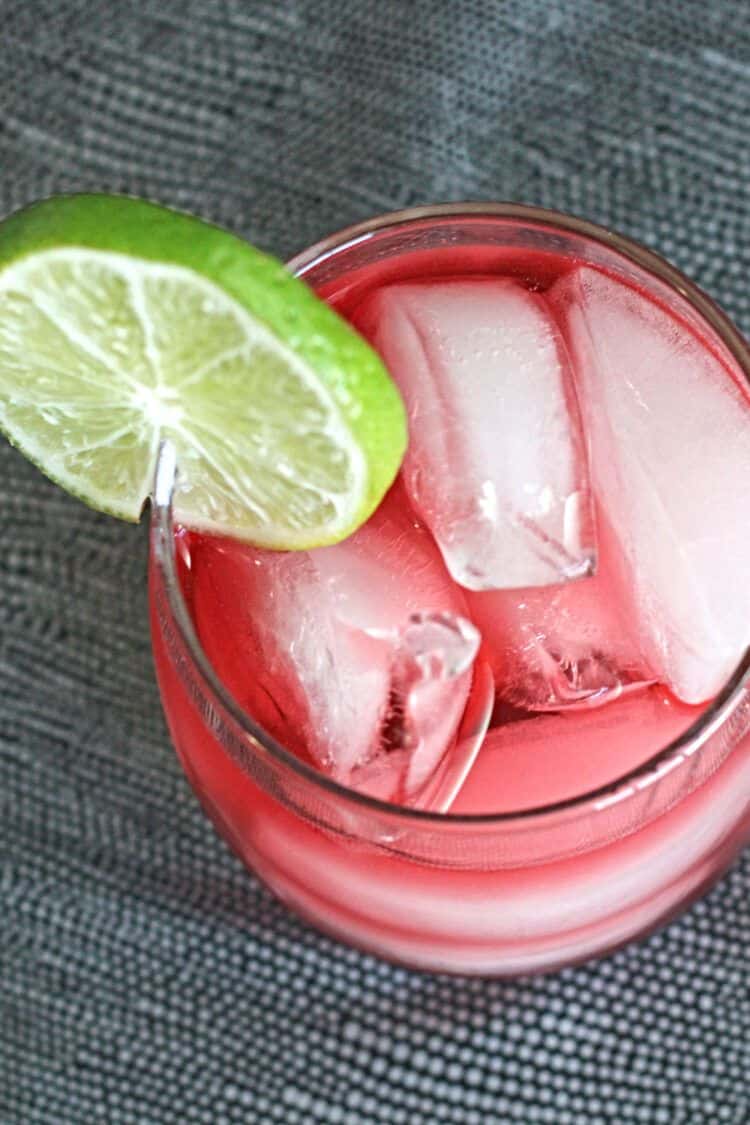 Overhead view of Vodka Cranberry drink with lime garnish