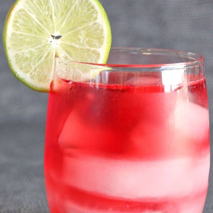 Vodka Cranberry drink with lime garnish