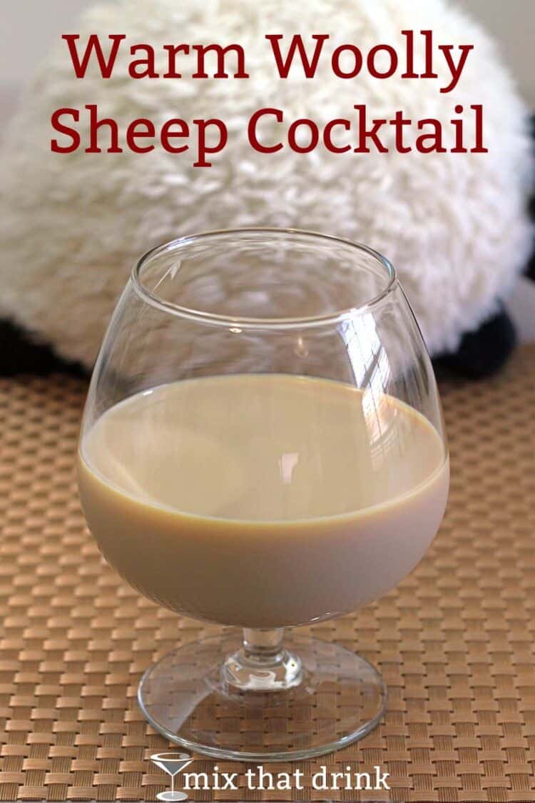 Warm Woolly Sheep cocktail in front of toy stuffed sheep
