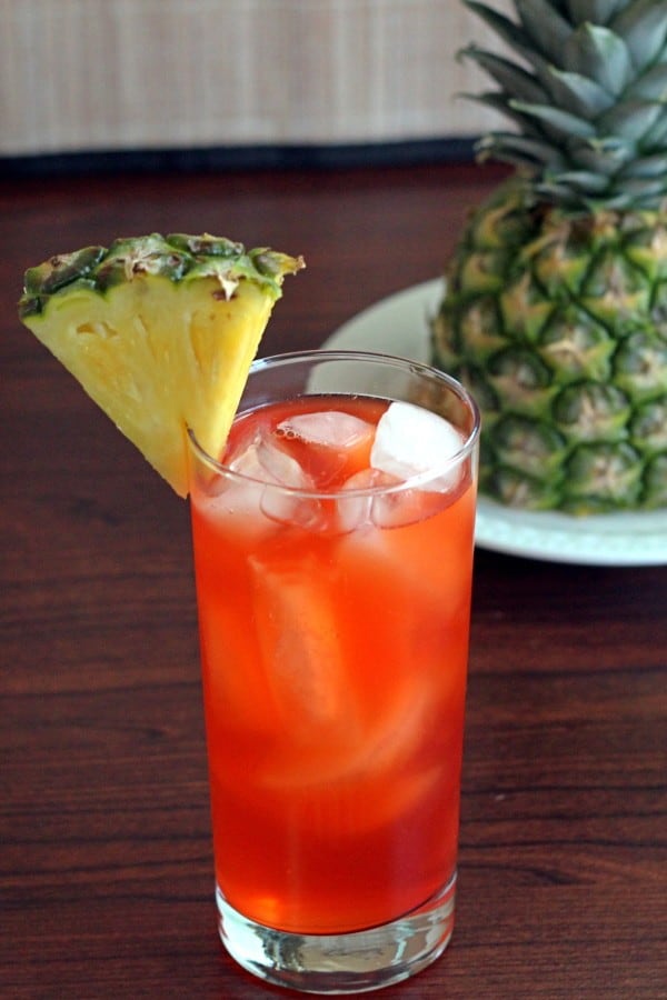 Western Sling drink with pineapple wedge