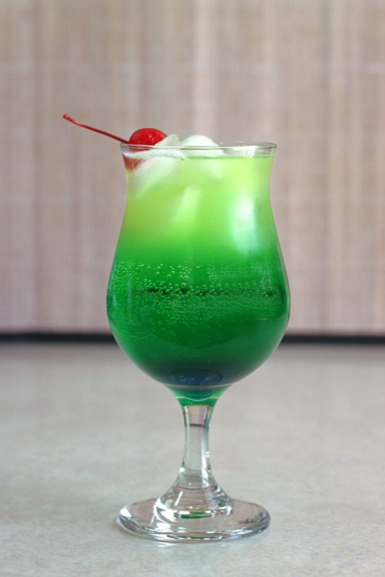 Bright green Zolezzi Cocktail with cherry